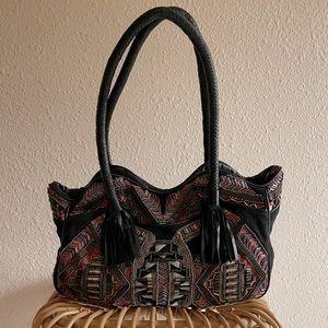 Unique beaded and embroidered Antik Batik bag with black leather tassels